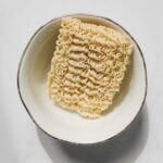 Photo of Uncooked Noodles on White Bowl